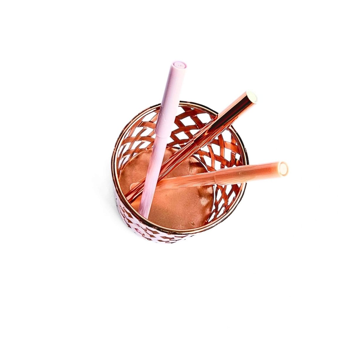 rose gold desk organiser with pens inside