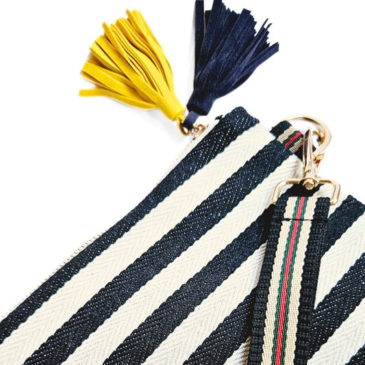 close up of tassels on stripe pencil bag