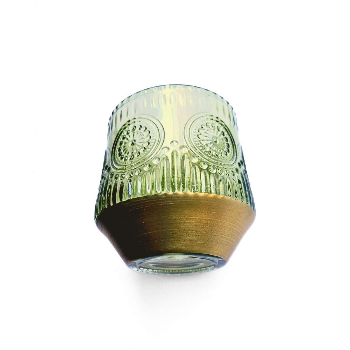 side view of vintage style green glass pen holder