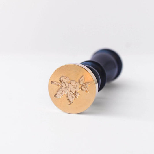 wax seal stamp with cherry blossom flower design engraved into brass