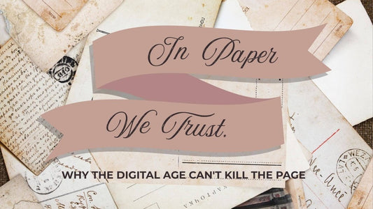 Pile of vintage papers and postcards with banner saying "In Paper We Trust"