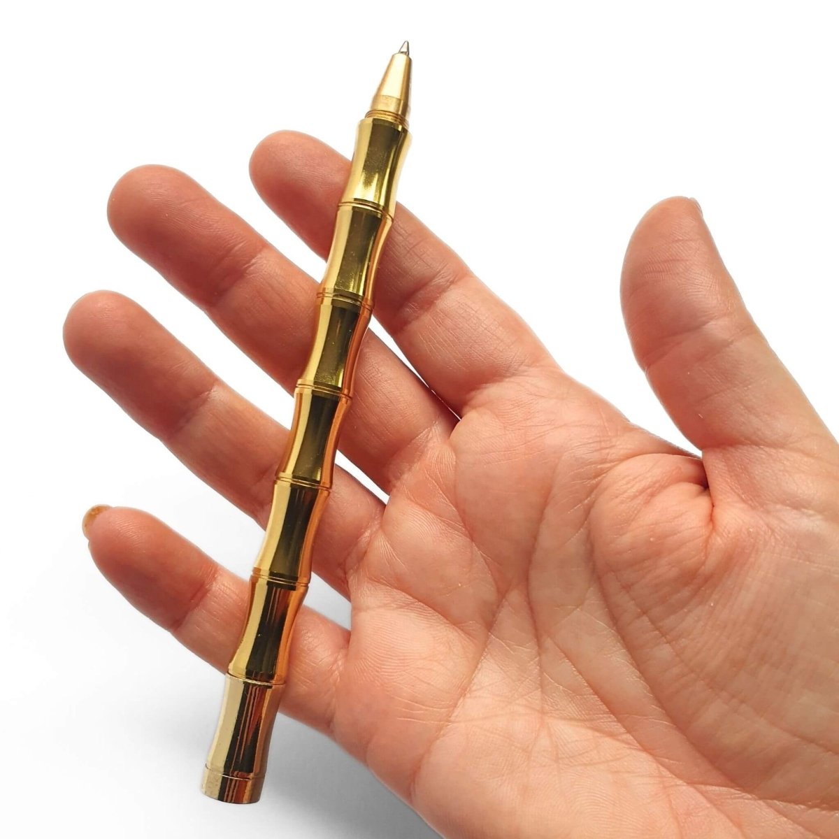 Bamboo Brass Pen in hand - Bounde