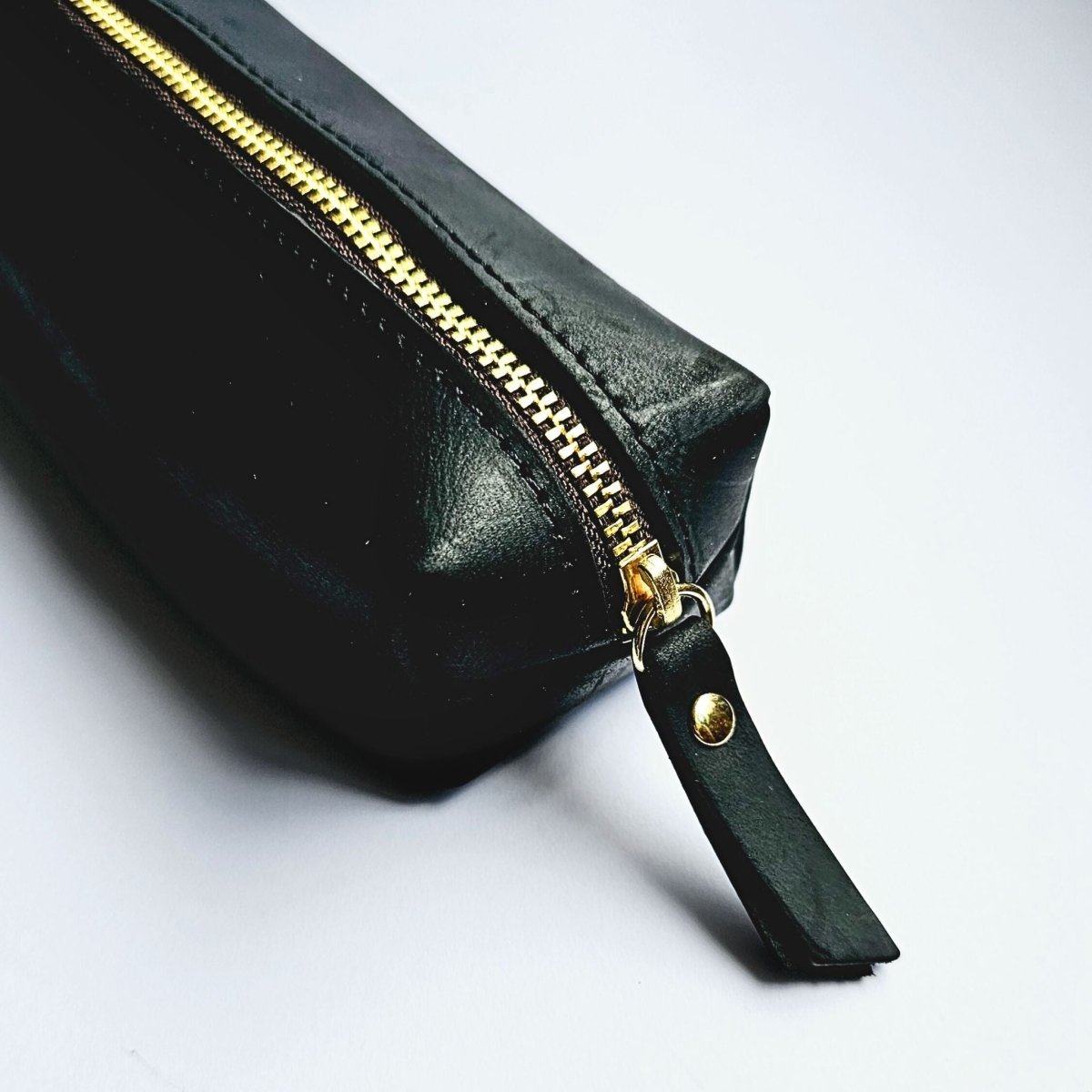 box style black leather pencil case close up