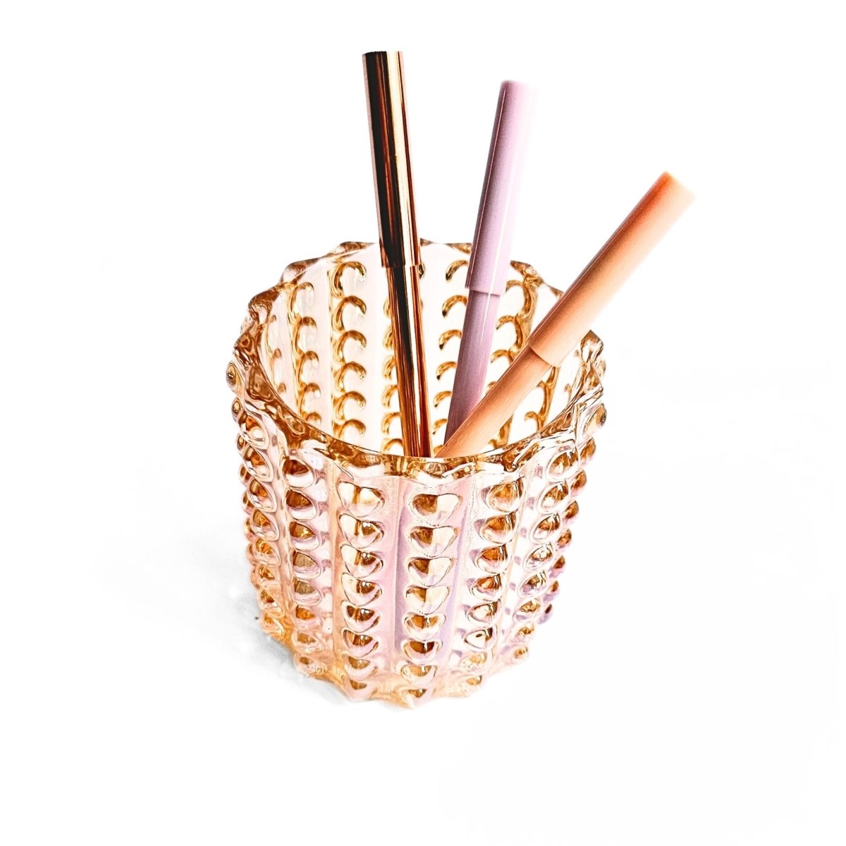 amber glass pen cup with pens inside