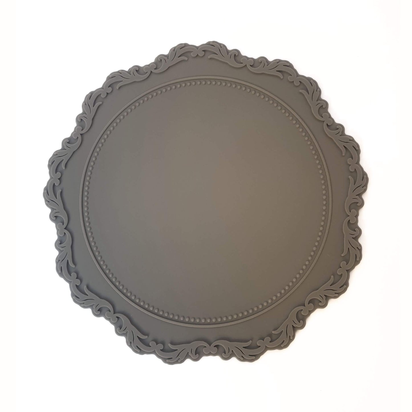 Charcoal grey round wax sealing mat with filigree  border detail