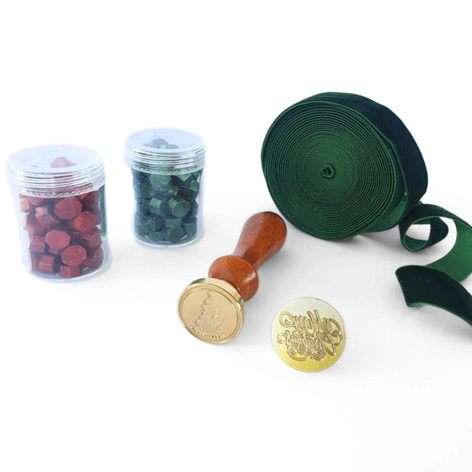 Wax Seal kits for Christmas gift wrap with green ribbon and green and red wax seal beads