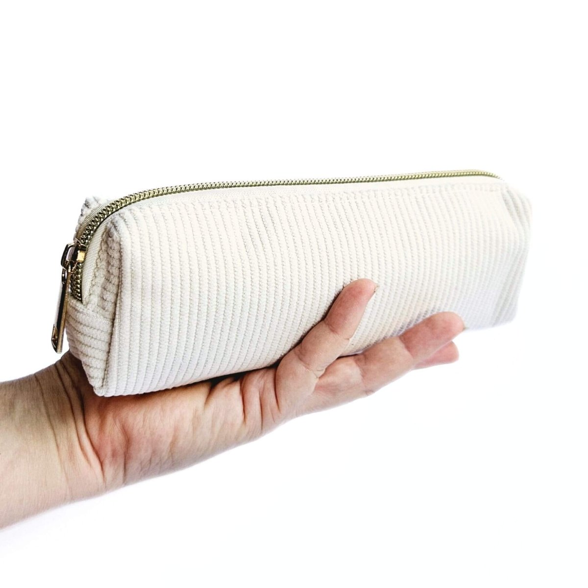 white cord pen bag with gold zipper