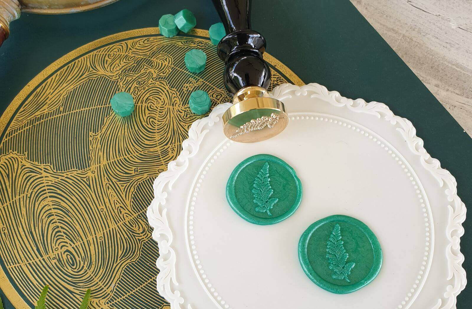 Green fern leaf wax seals with fern wax seal stamp and white wax seal silicone mat