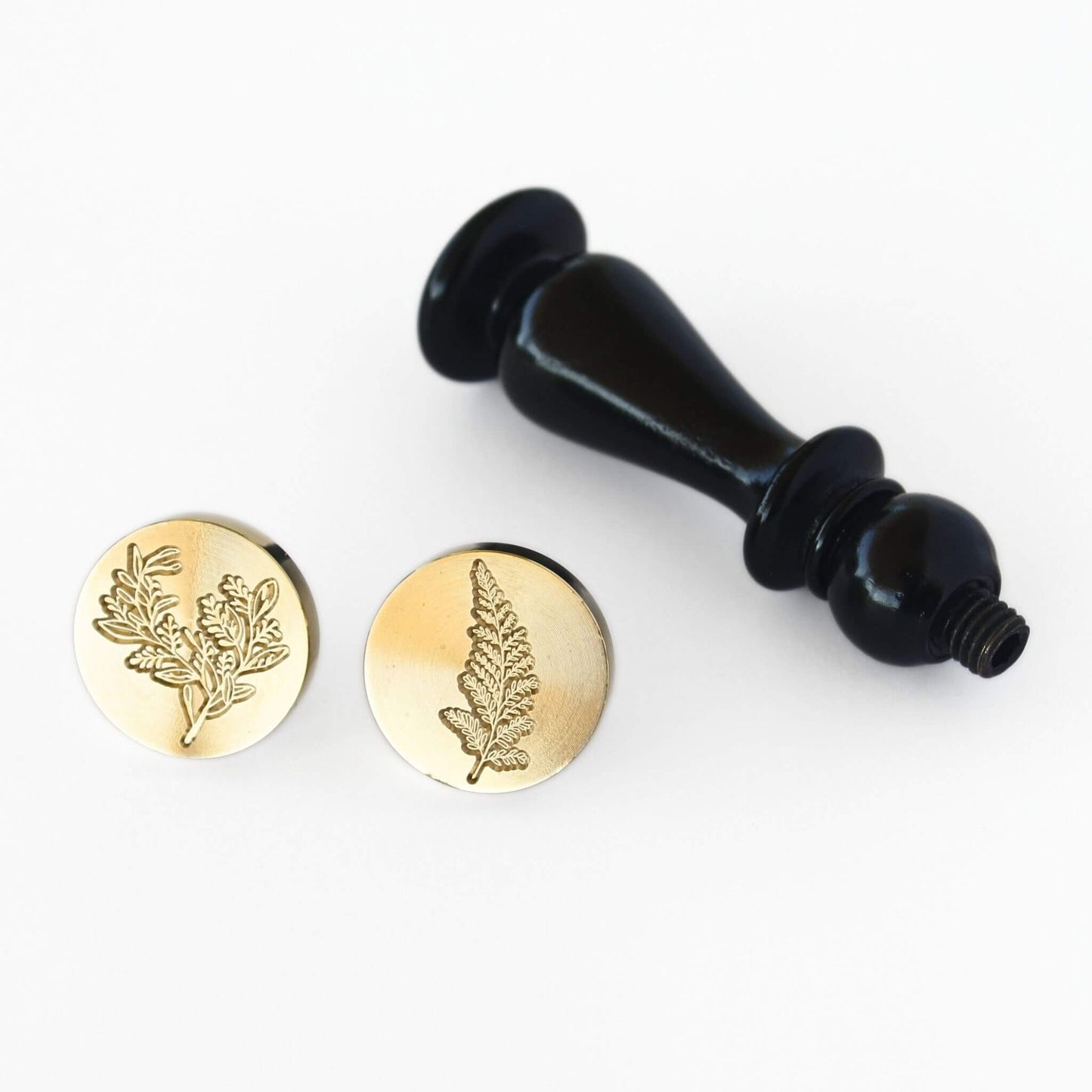 brass fern and foliage wax seal heads with black wooden vintage handle