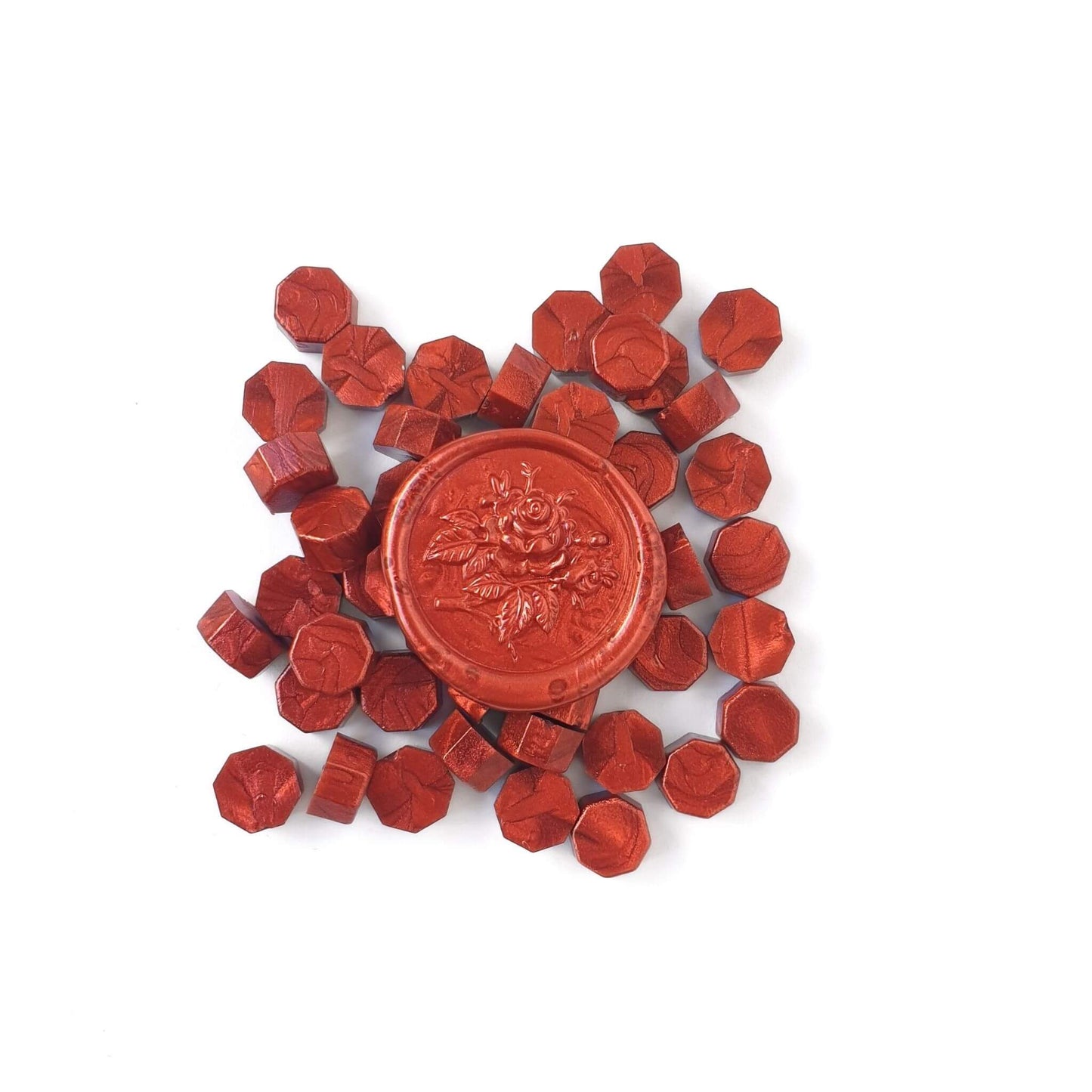 garnet red sealing wax beads with a red metallic wax seal in the middle