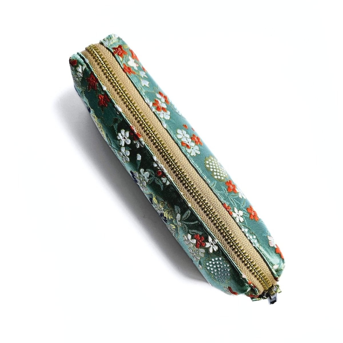 top view of green floral satin pencil case