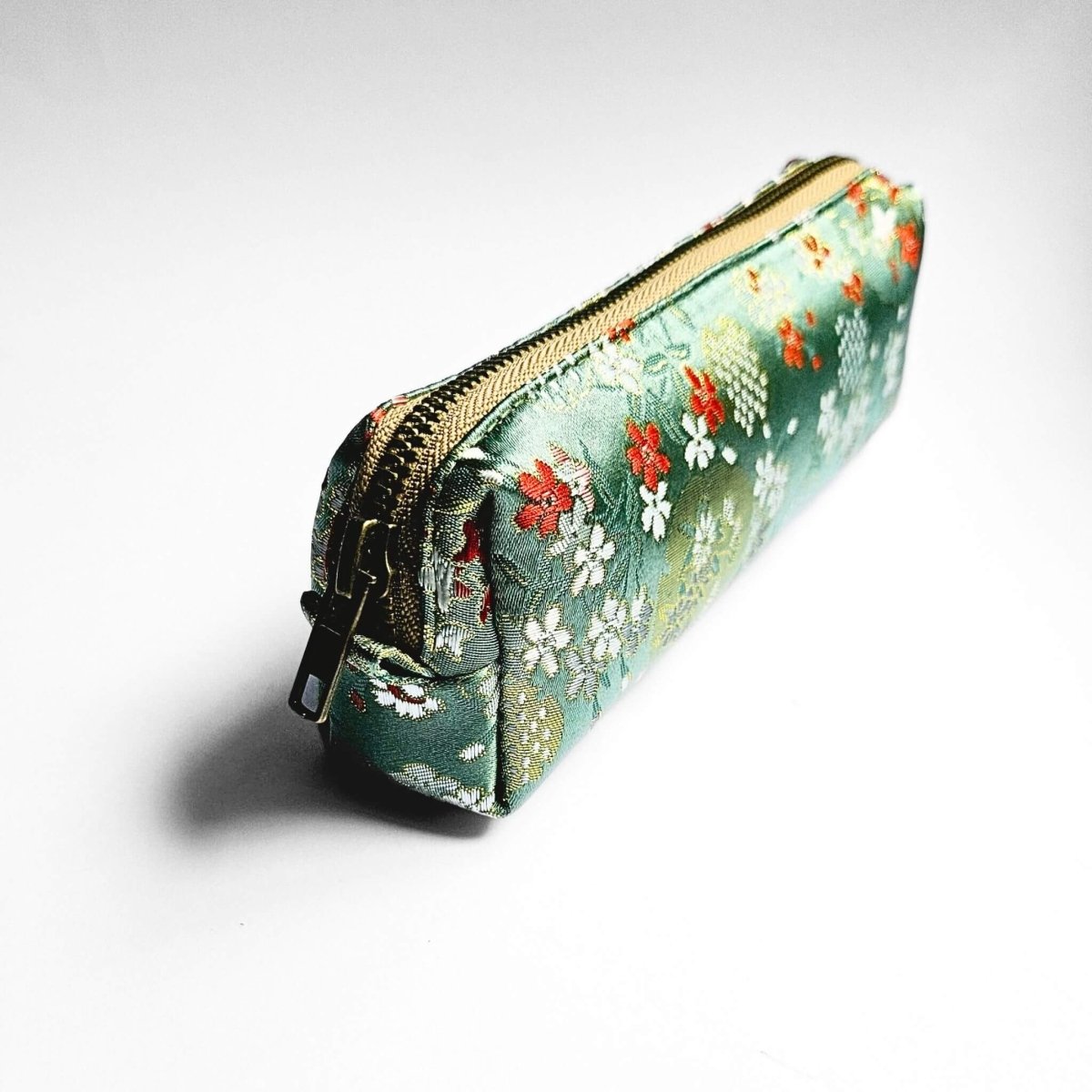 green floral pencil case with gold zip front view