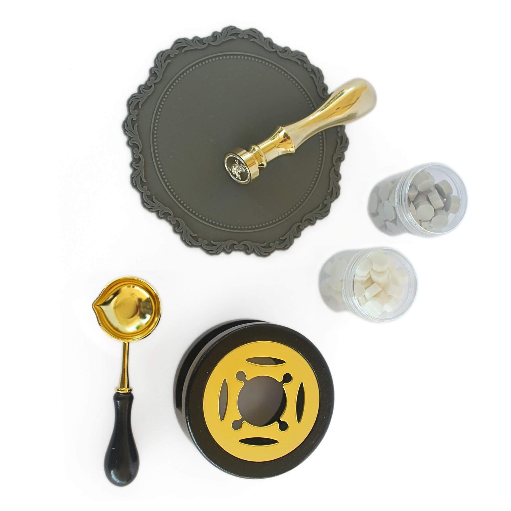 Goddess wax sealing kit with gold brass wax seal, black wax melting stove and spoon and sealing wax beads in grey and white