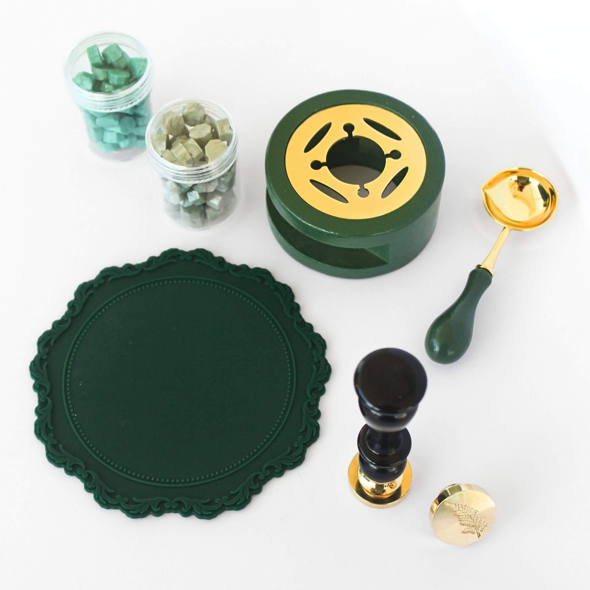 Green lovers wax seal kit with green sealing wax, green wax melting tools, green wax sealing mat and fern and leaf wax seals