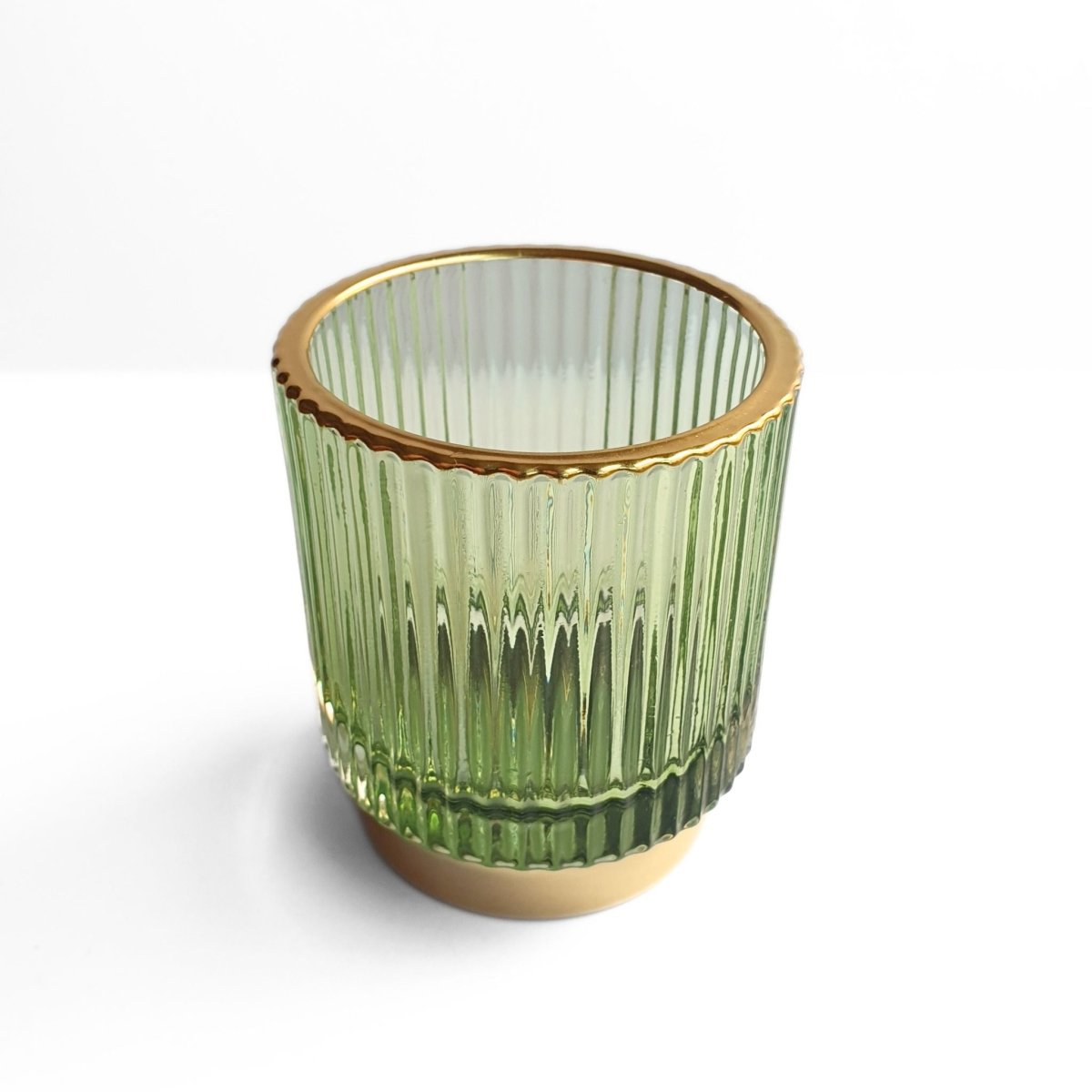 ribbed green glass pen holder with gold rim