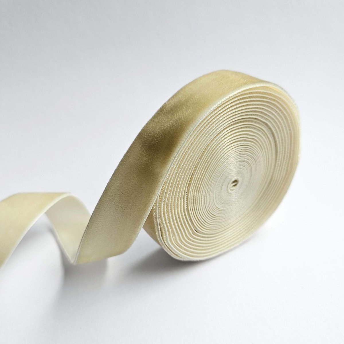 ivory velvet ribbon roll unravelling