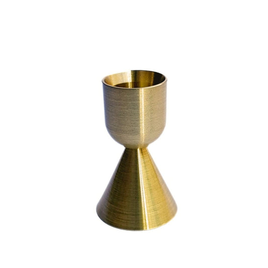 Gold Brass candle holder on a white background