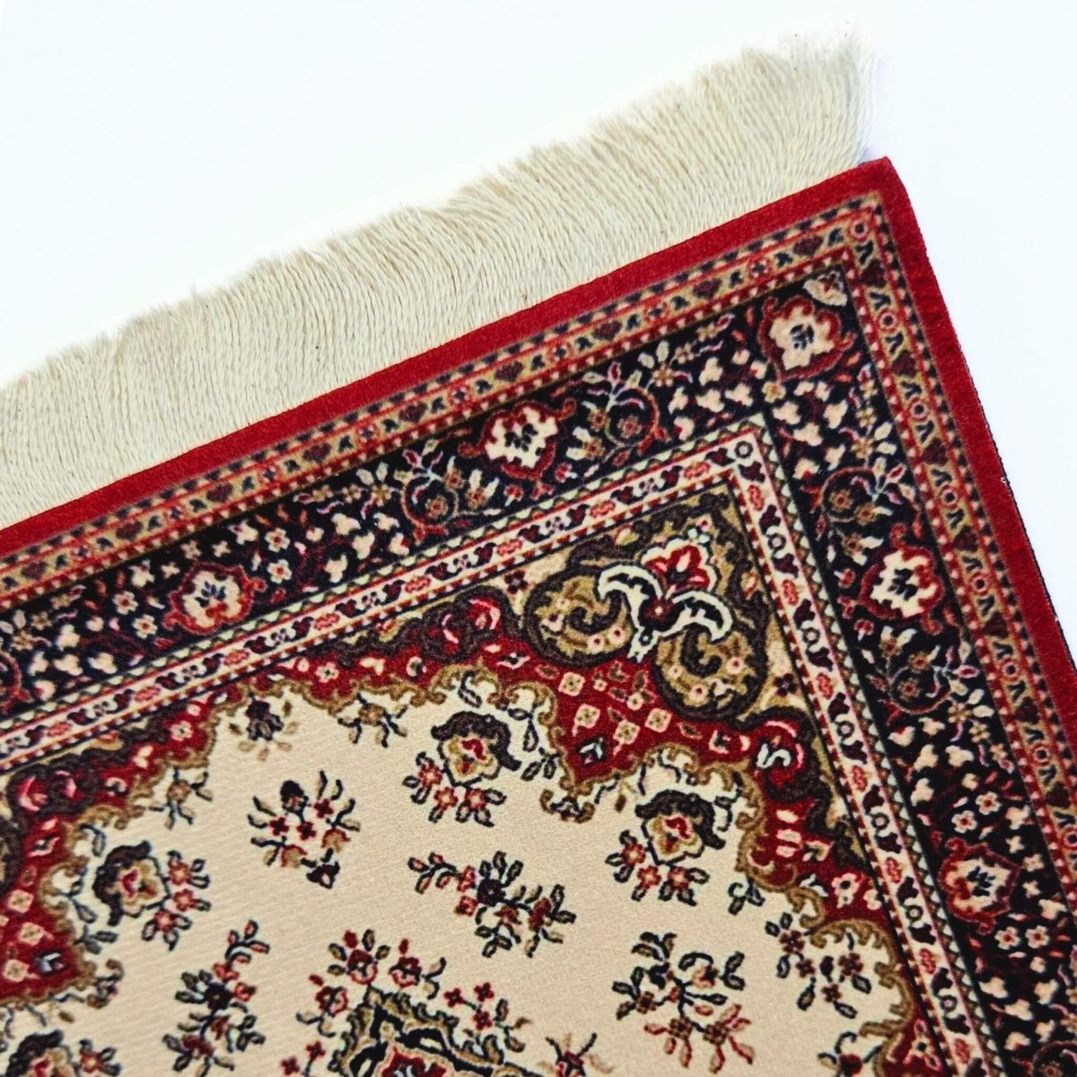 fringed detail of rug mouse mat