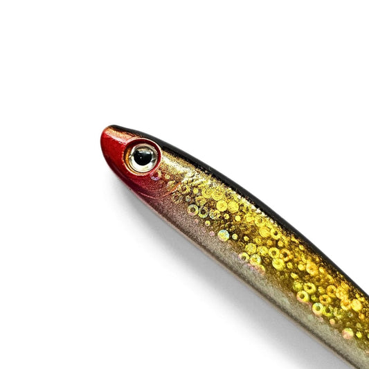 Close-up of a fish pen with red and gold gradient on a white background