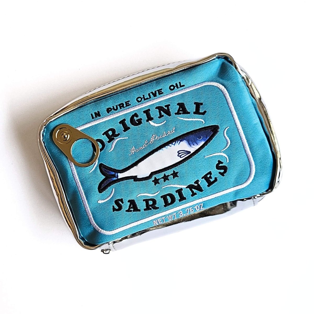 blue sardine tin shaped pencil case with embroidery text and fish illustration