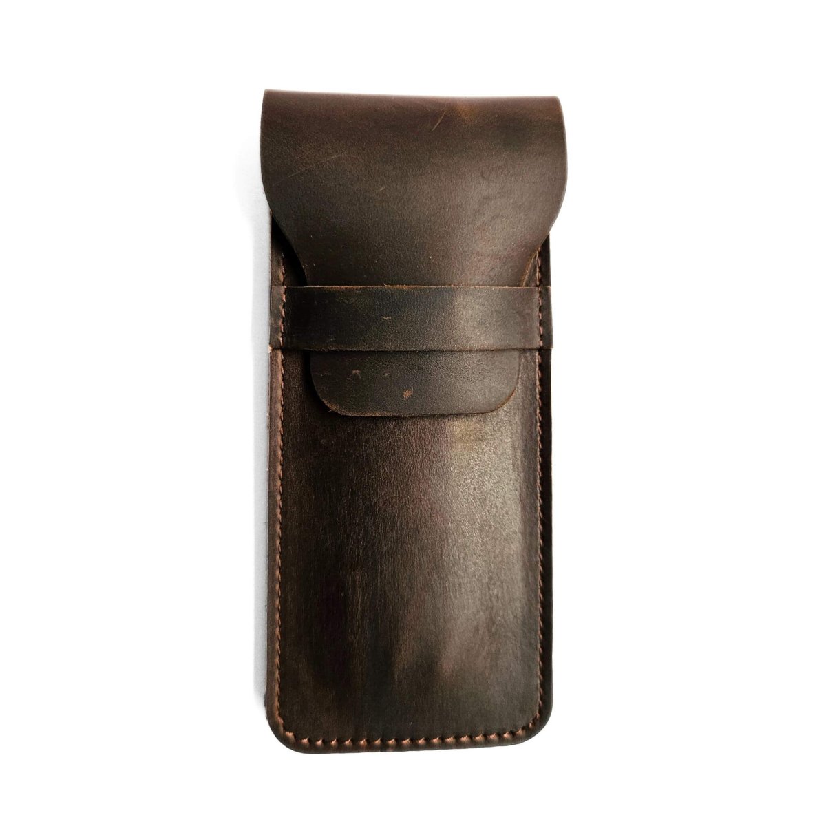 flat brown leather pen case with flap closure