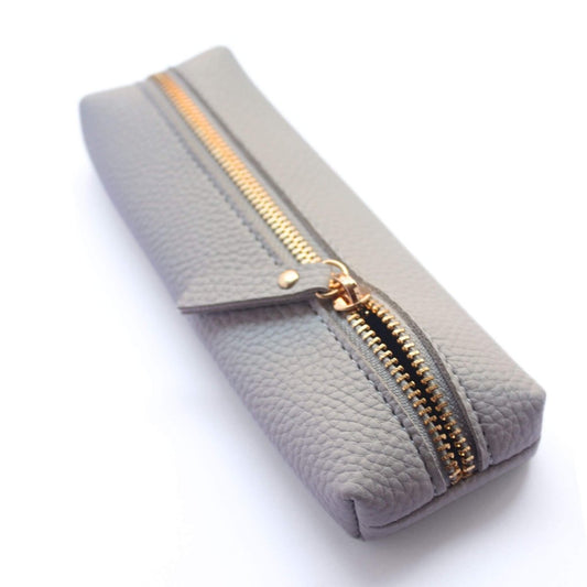 small grey pencil case with zip half open