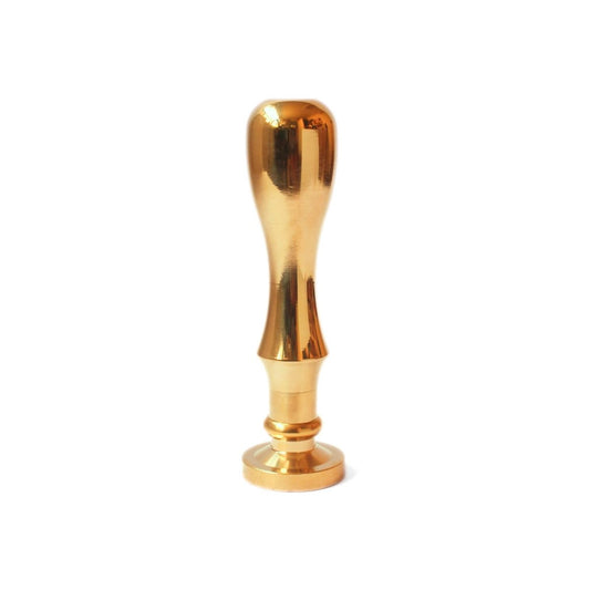 Side view of gold wax seal stamp