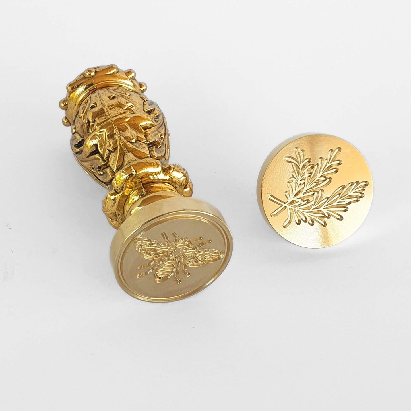 Tuscan wax seal handle in gold with bee wax seal and rosemary foliage wax seal head from Tuscan Wax Seal Kit