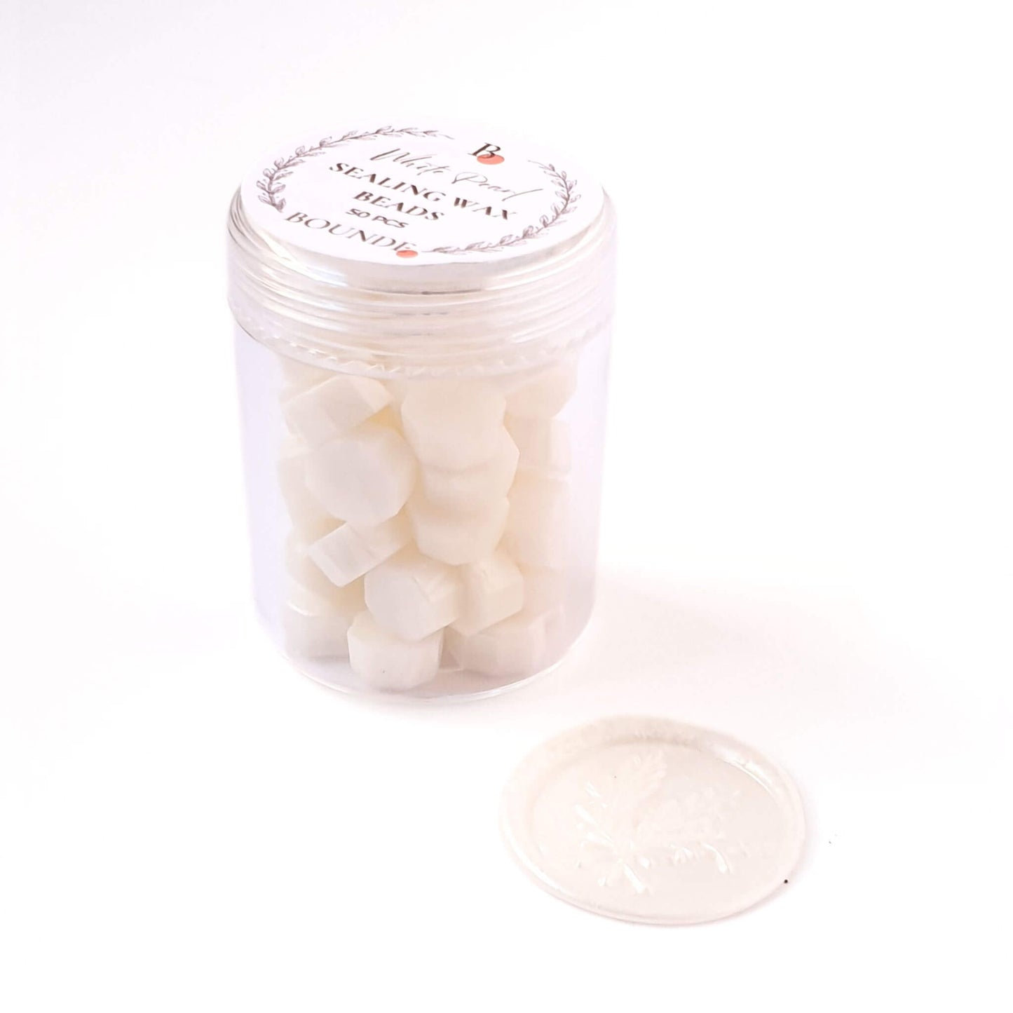 Jar of white pearl seling wax beads with a white pearl wax seal beside it